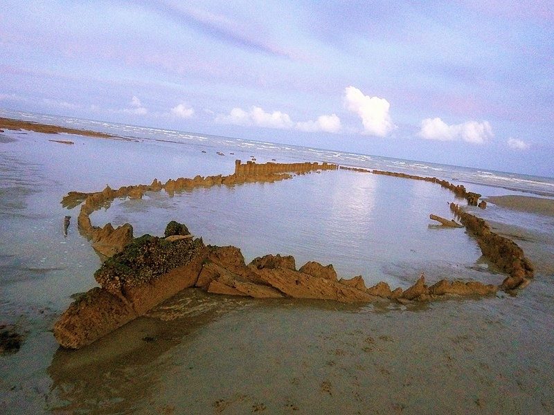 A 2019 photo of the wreck of the Amsterdam at low tide.