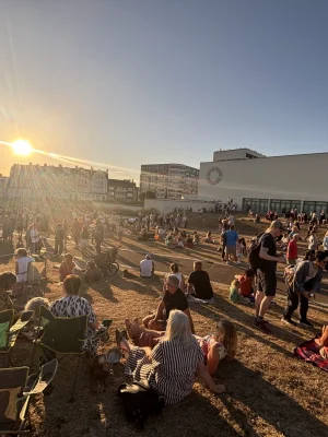 Eclipse watchers gather outside the pavilion on Wednesday.